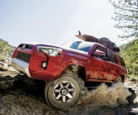 A red 2019 Toyota 4Runner offroading