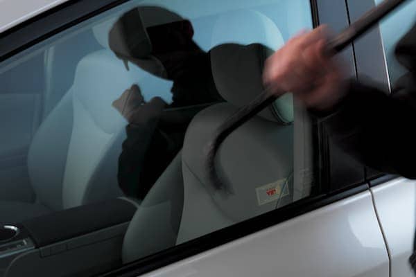 2019 Toyota Sienna A man trying to break a window on the Toyota Sienna with a crowbar