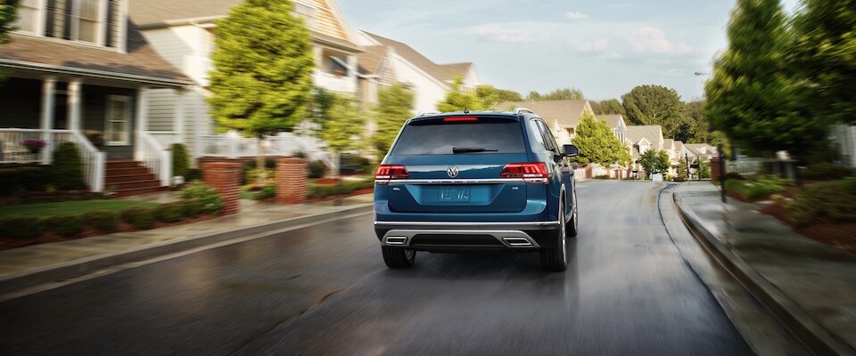 2019 Volkswagen Atlas A blue 2019 VW Atlas driving down a suburban road
