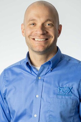 Staff member Andrew Karczewski from 0b04690a9ebd