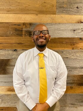 Staff member Michael Brunson from ID_a6d32ccb6132