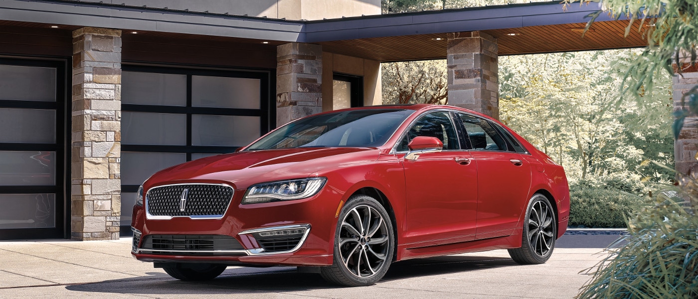 Red 2020 Lincoln MKZ near house