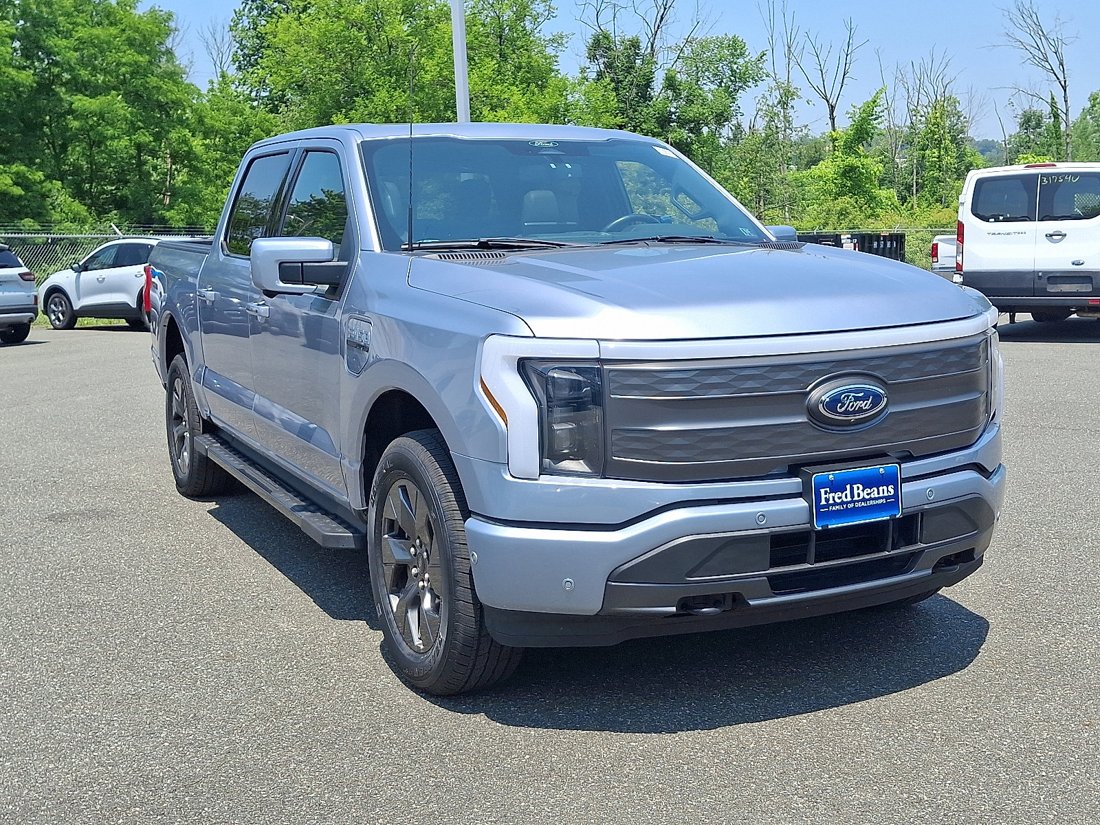 Used 2022 Ford F-150 Lightning Lariat with VIN 1FT6W1EV7NWG14115 for sale in Boyertown, PA