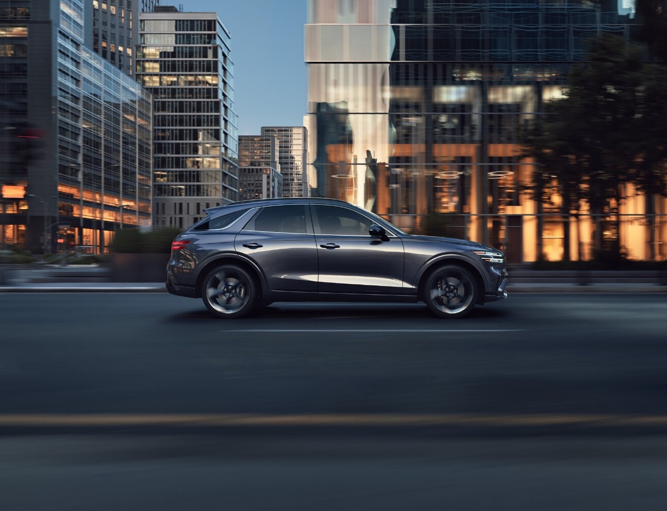Genesis GV70 driving in city