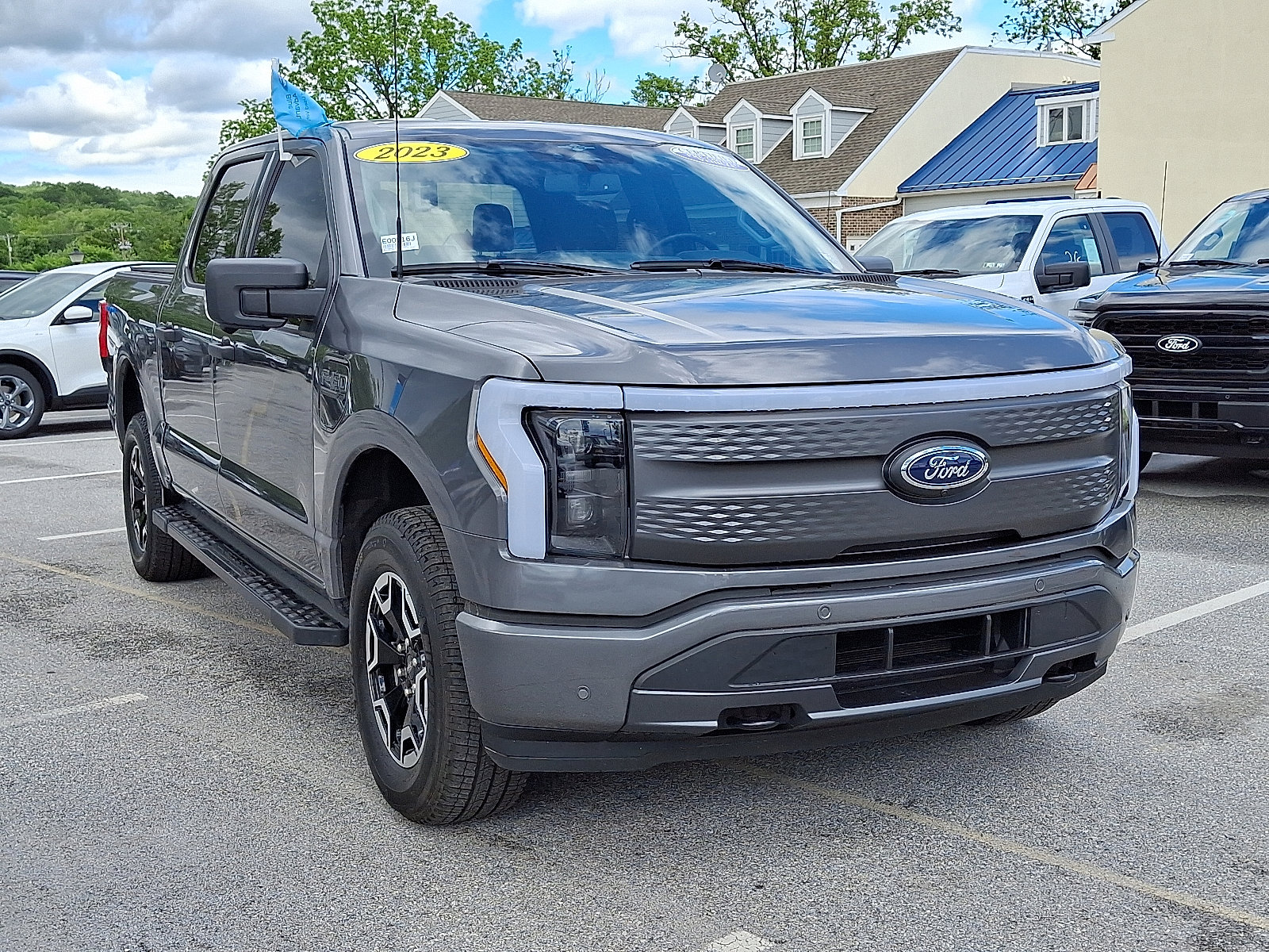 Certified 2023 Ford F-150 Lightning XLT with VIN 1FTVW1EL2PWG52848 for sale in Exton, PA