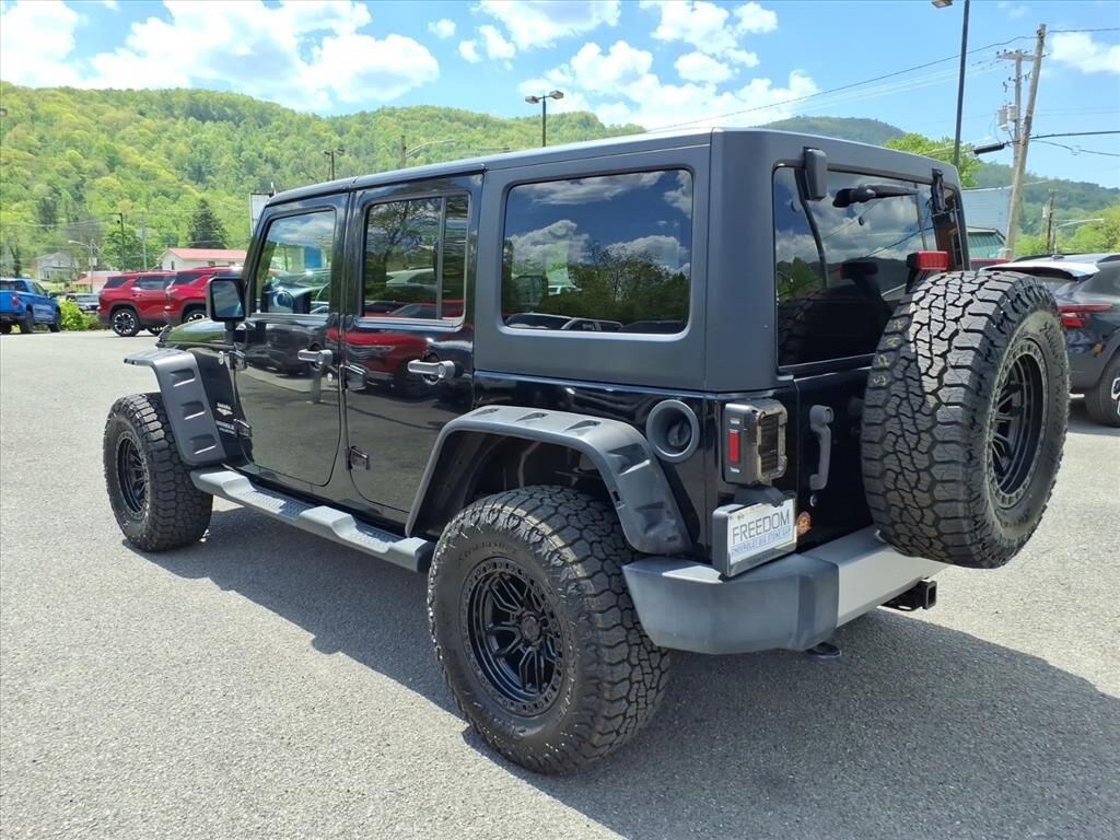 Used 2014 Jeep Wrangler Unlimited Sahara 4x4 SUV