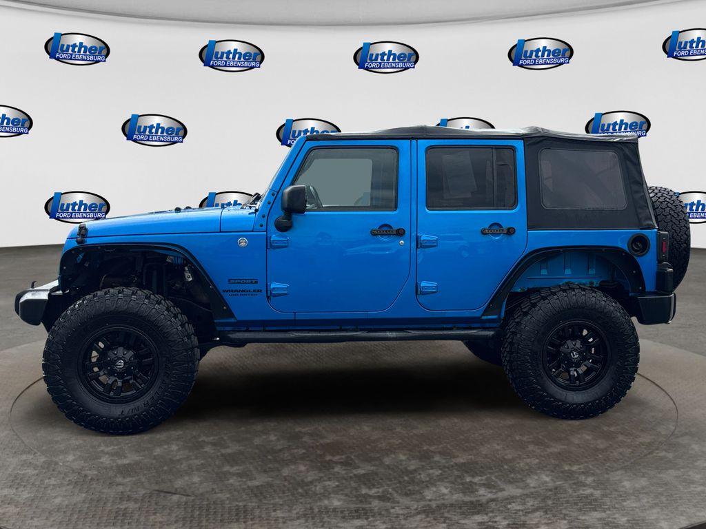 Used 2014 Jeep Wrangler Unlimited Sport with VIN 1C4BJWDG5EL316953 for sale in Ebensburg, PA