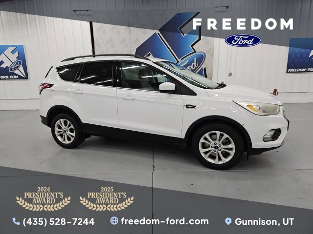 Used 2017 Ford Escape SE with VIN 1FMCU9GD8HUC52111 for sale in Gunnison, UT