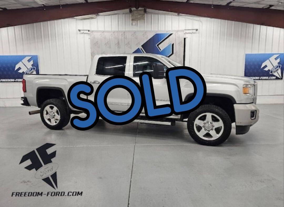 2015 GMC Sierra 4WD Crew Cab Short Box's photo