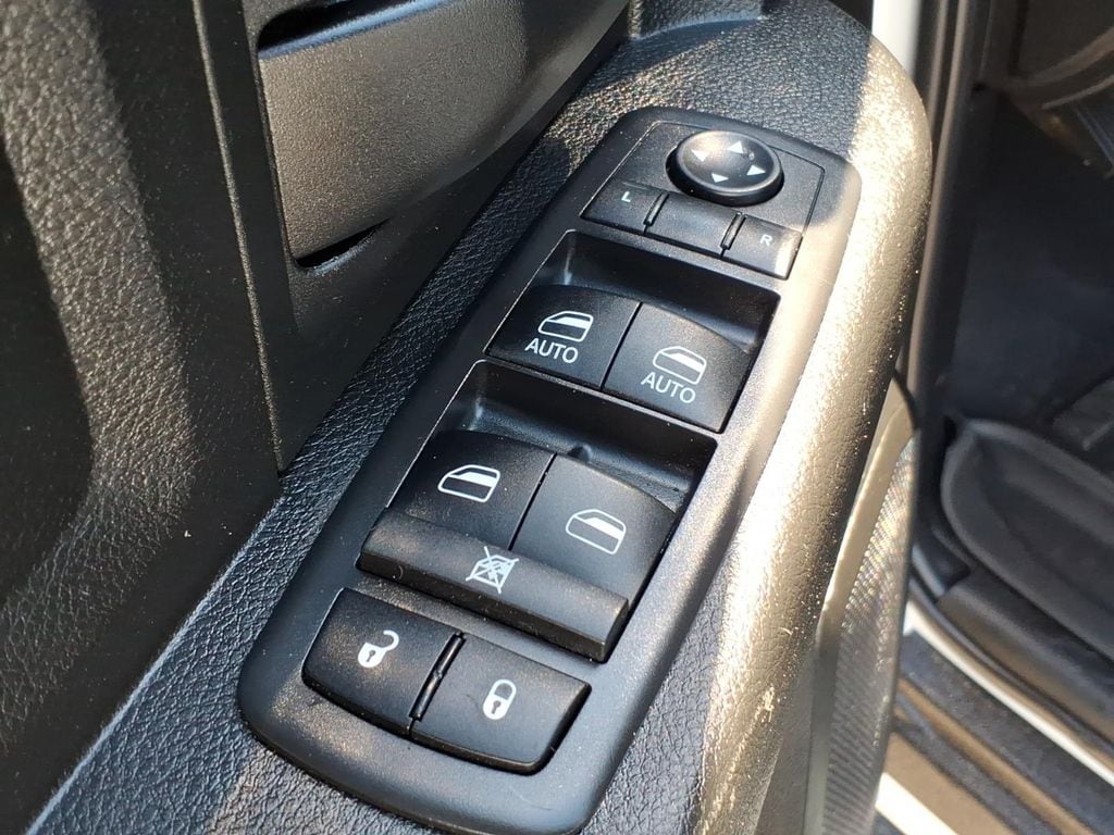 used 2019 Ram 1500 car, priced at $24,599