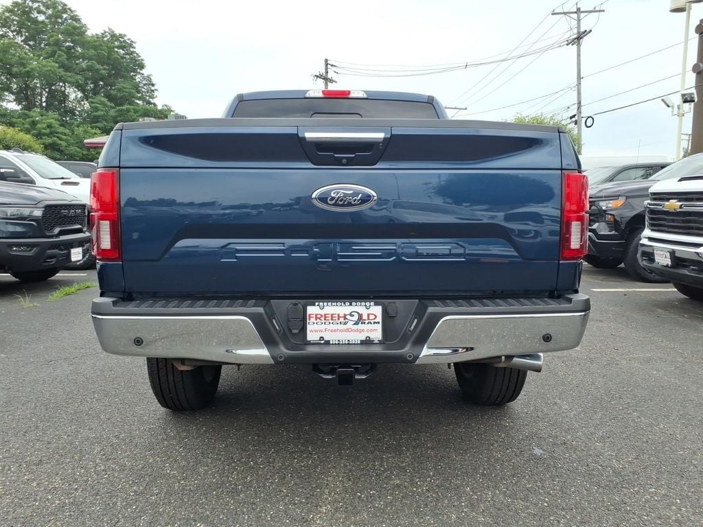 used 2018 Ford F-150 car, priced at $23,199