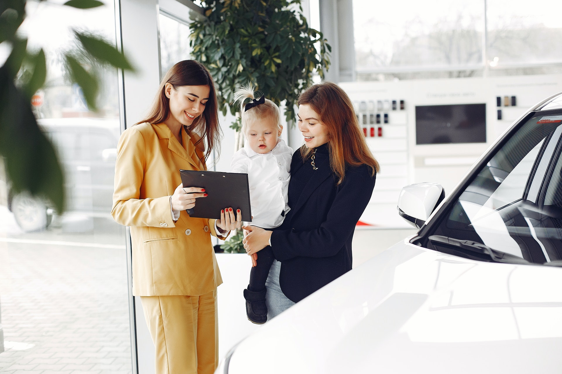 Sales rep with customer on sales floor.