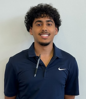 Staff member Ken Abraham from ID_89c530