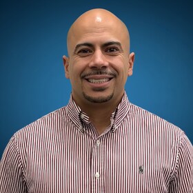 Staff member Carlos Ramos from 7992db6256a8