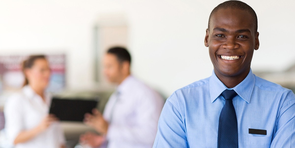Subaru sales person smiling.