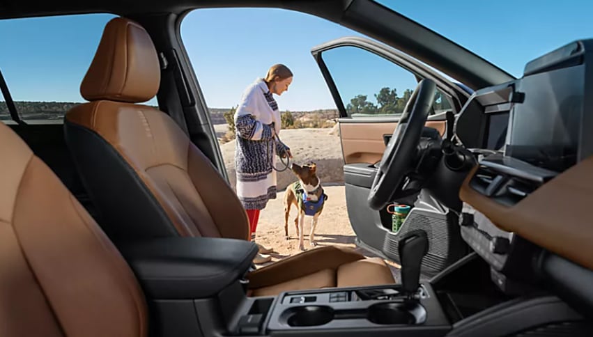2026 Subaru Outback interior passenger view with door opened.