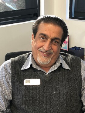 Staff member Sayed Hassibullah from ID_5b88f7606080