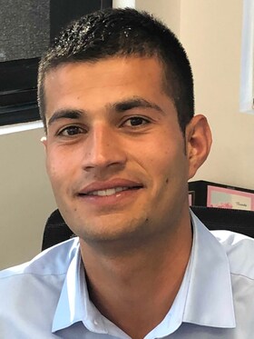 Staff member Ahmad Rasikh from ID_5b88f7606080