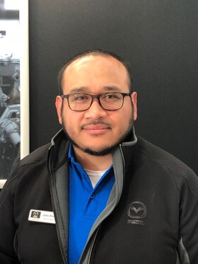 Staff member Julio S. Rivera from ID_5b88f7606080