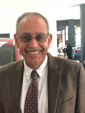 Staff member Abby Manteghi from ID_5b88f7606080