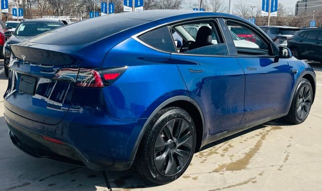 Used 2025 Tesla Model Y Long Range with VIN 7SAYGAEE2SF266541 for sale in Dallas, TX
