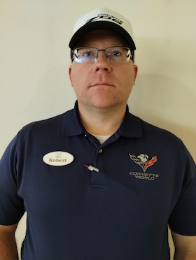 Staff member Robert Szyka from 13cd3c71ddeb