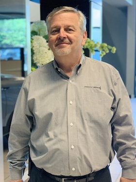 Staff member Neil Helfrich from ID_69a1d8d4d83b