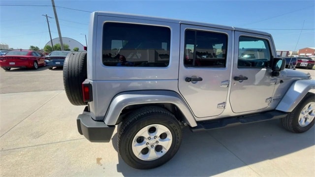 Used 2015 Jeep Wrangler Unlimited Sahara with VIN 1C4BJWEG0FL773993 for sale in Clay Center, KS