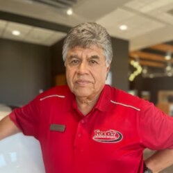 Staff member John Sanchez from ID_5b4dfd5b2495
