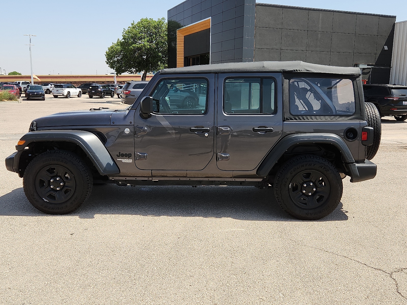 Used 2021 Jeep Wrangler Unlimited Sport with VIN 1C4HJXDN9MW801124 for sale in Lubbock, TX