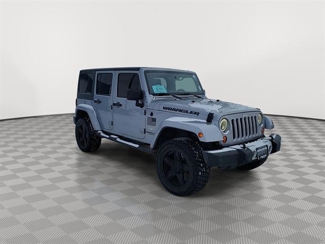 Used 2013 Jeep Wrangler Unlimited Sahara with VIN 1C4BJWEG4DL657127 for sale in Winner, SD