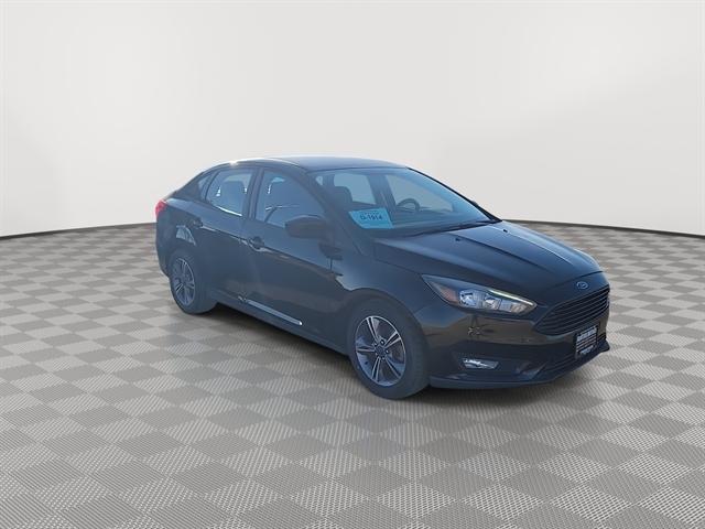 Used 2018 Ford Focus SE with VIN 1FADP3FEXJL312754 for sale in Winner, SD
