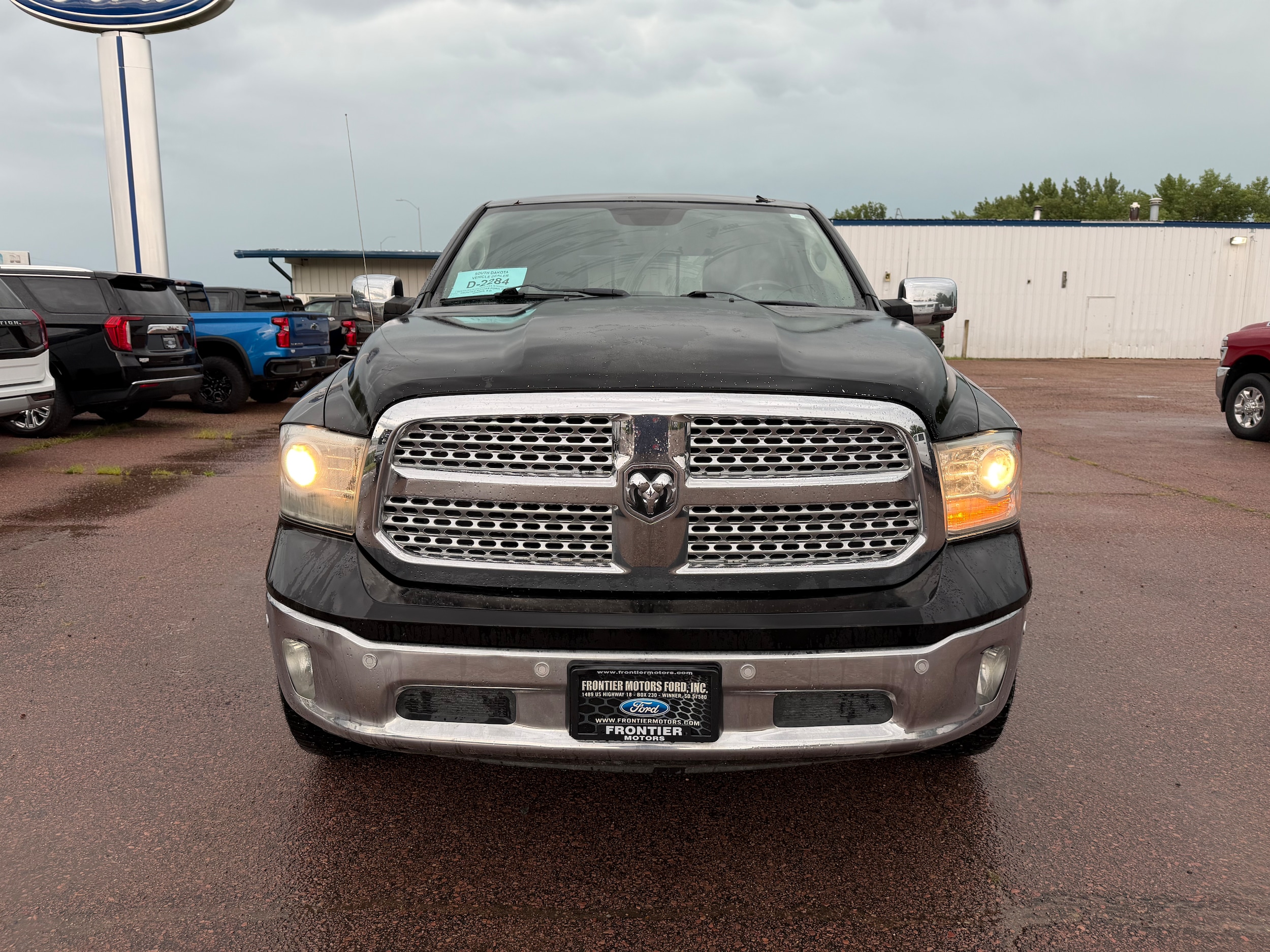Used 2014 RAM Ram 1500 Pickup Laramie with VIN 1C6RR7NT5ES412782 for sale in Winner, SD