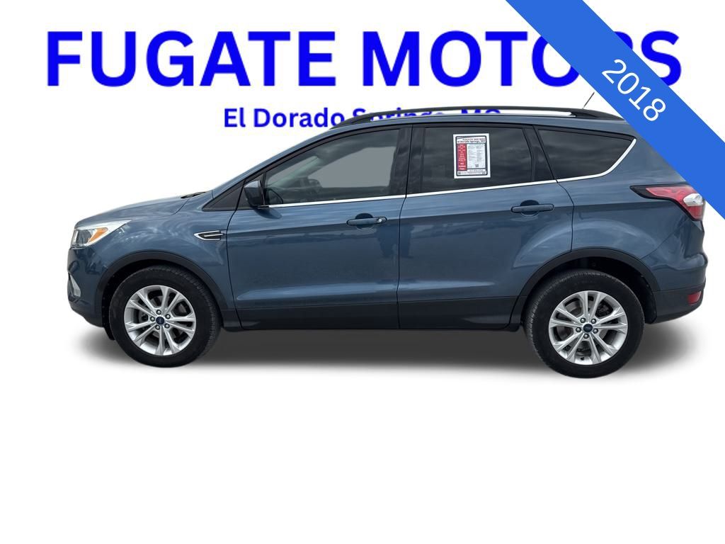 Used 2018 Ford Escape SE with VIN 1FMCU0GD6JUA96877 for sale in El Dorado Springs, MO