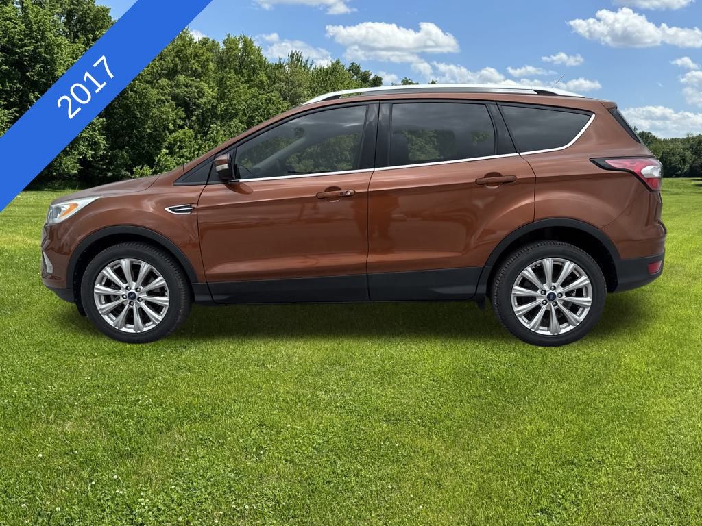 Used 2017 Ford Escape Titanium with VIN 1FMCU0J92HUC80308 for sale in El Dorado Springs, MO