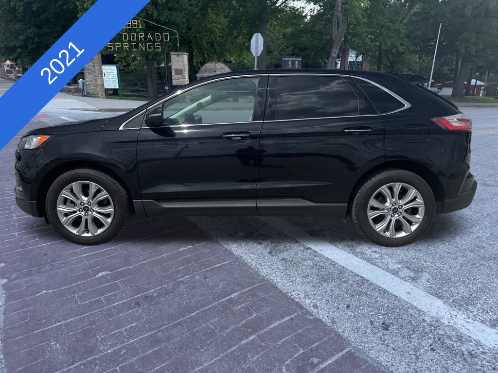 Used 2021 Ford Edge Titanium with VIN 2FMPK3K9XMBA54315 for sale in El Dorado Springs, MO