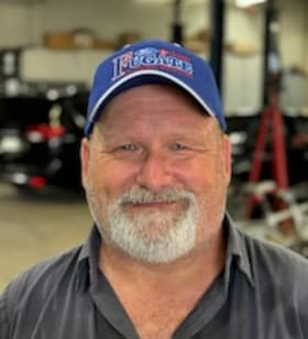 Staff member Larry Drake from ID_ba4a78a45d67