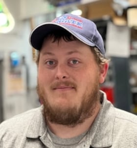 Staff member Zachary Whitaker from ID_ba4a78a45d67