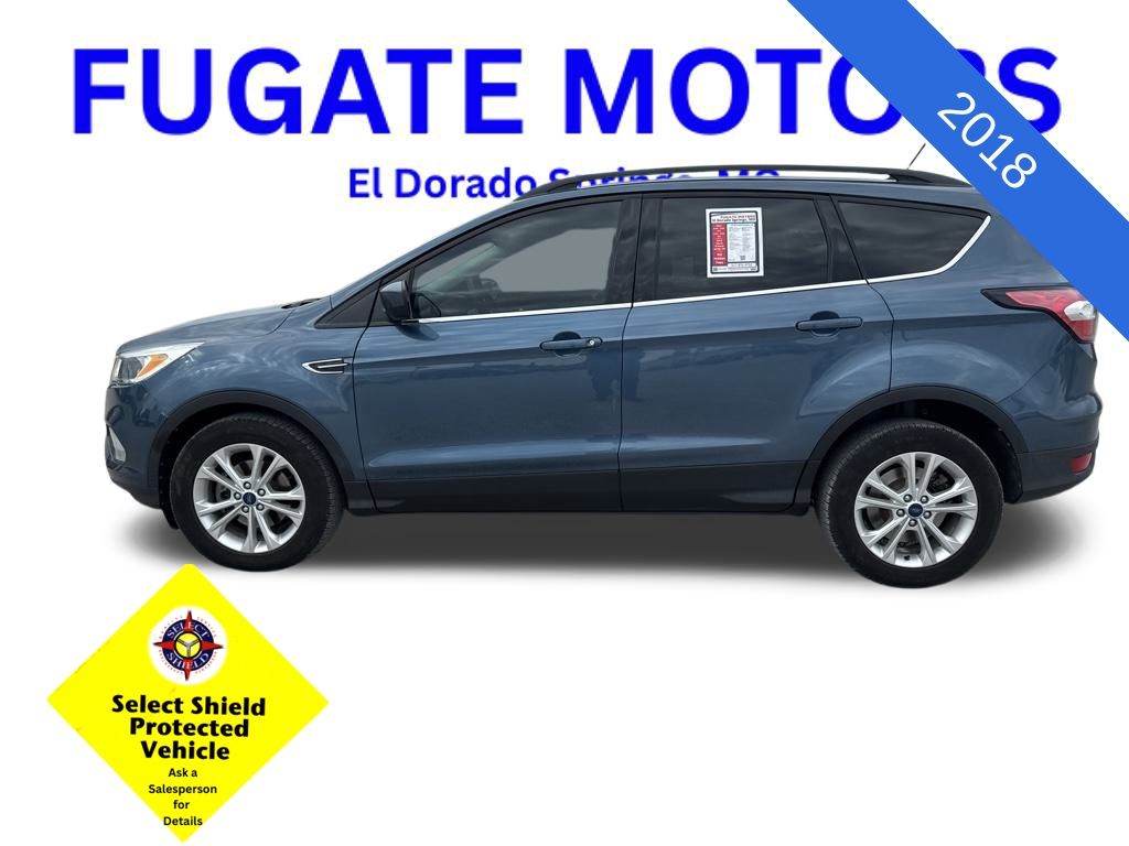 Used 2018 Ford Escape SE with VIN 1FMCU0GD6JUA96877 for sale in Kansas City