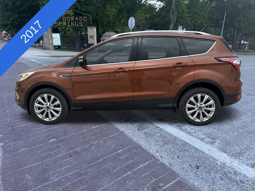 Used 2017 Ford Escape Titanium with VIN 1FMCU0J92HUC80308 for sale in El Dorado Springs, MO