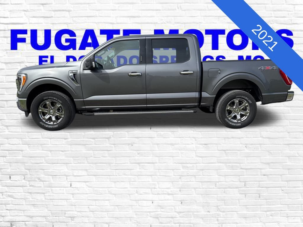 Used 2021 Ford F-150 XLT with VIN 1FTEW1EP1MFC05703 for sale in Kansas City