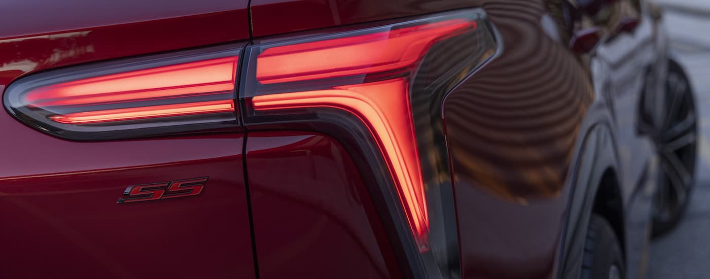 Fair Oaks Chevy Dealer - 2024 Chevy Blazer EV SS - Taillight.jpg A close up shows the passenger side taillight on a red 2024 Chevy Blazer EV SS after visiting a Fair Oaks Chevy dealer.