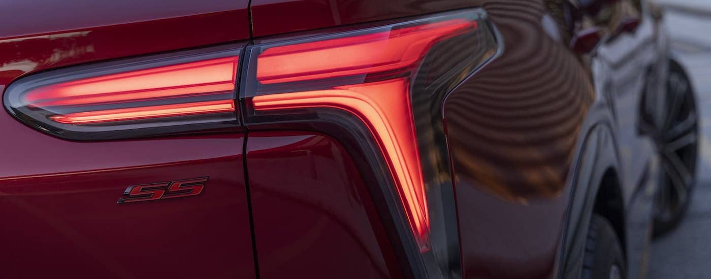 A close up of the passenger side taillight on a red 2024 Chevy Blazer EV SS at a Fair Oaks Chevy dealer.