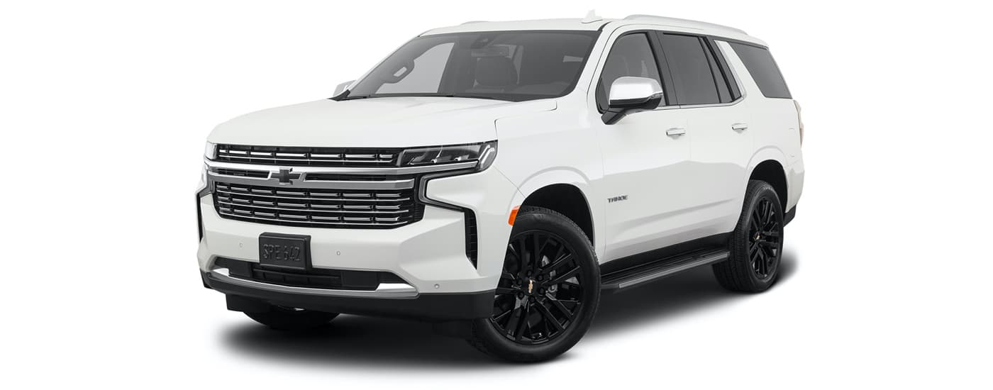 A white 2022 Chevy Tahoe Premier is shown angled left.