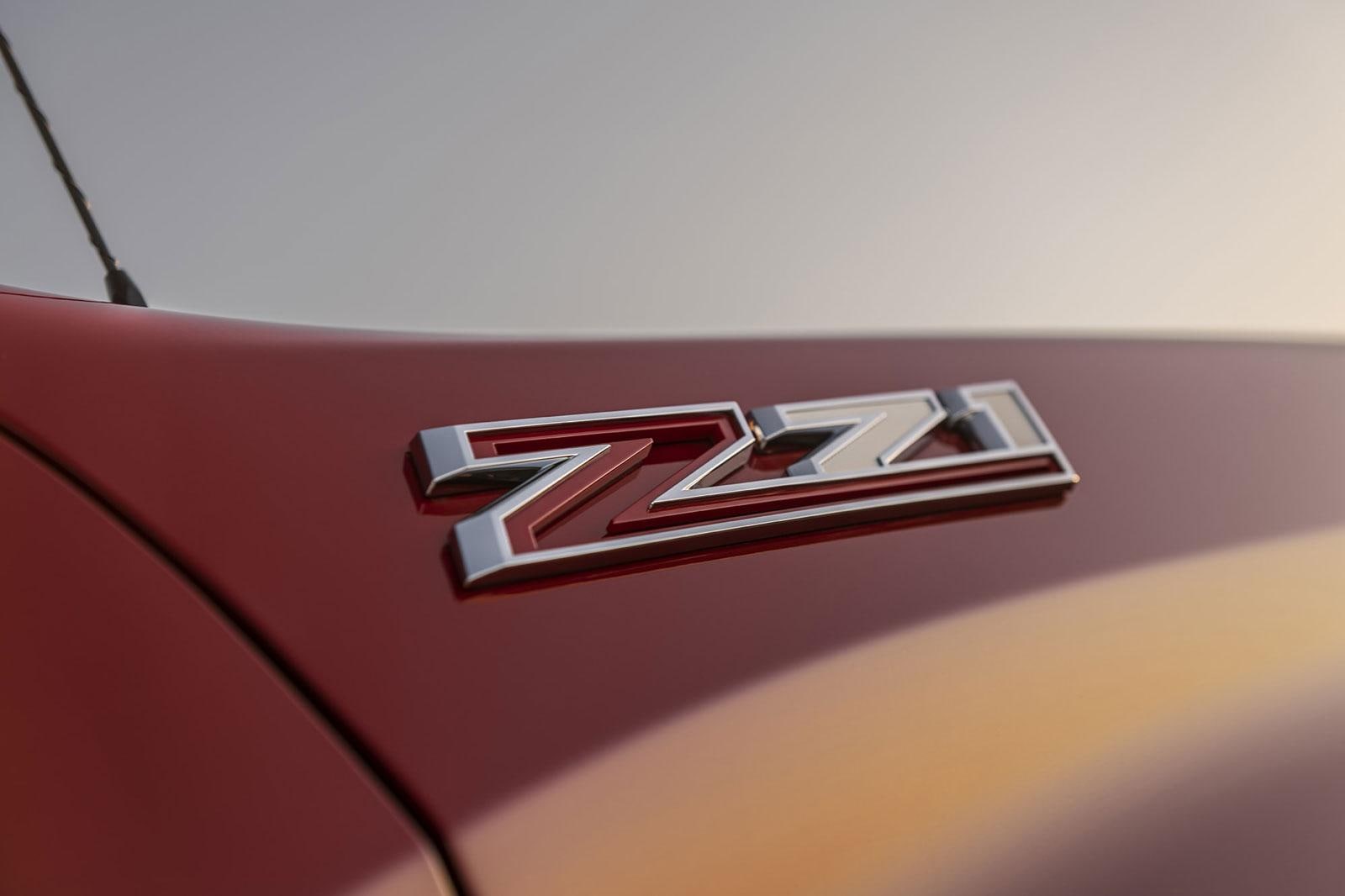 Red and silver Z71 emblem on a red Chevy Silverado