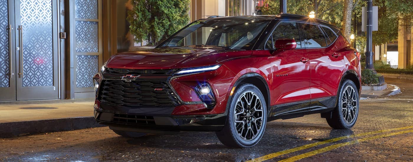 A red 2023 Chevy Blazer RS is angled left.