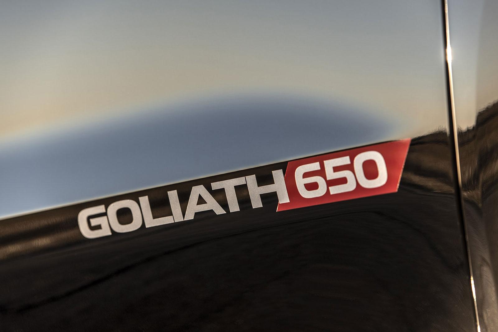 Close-up of a Goliath 650 badge on a black Chevy Silverado