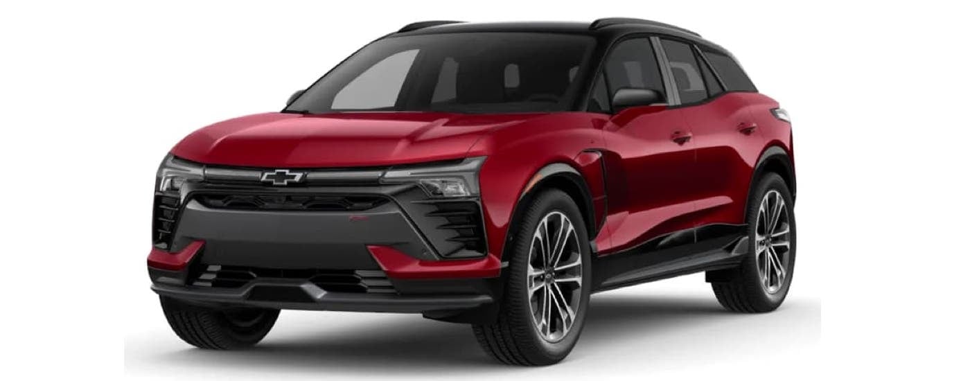 A red 2024 Chevy Blazer EV is shown angled left.
