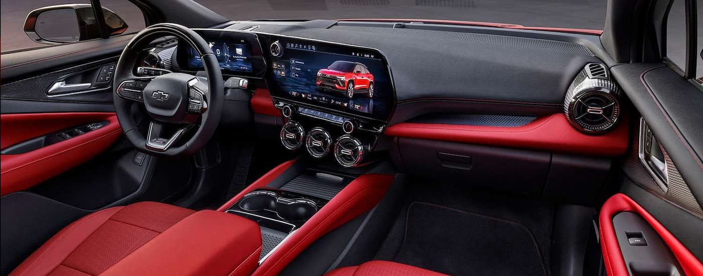 The black and red interior of a 2023 Chevy Blazer EV is shown.