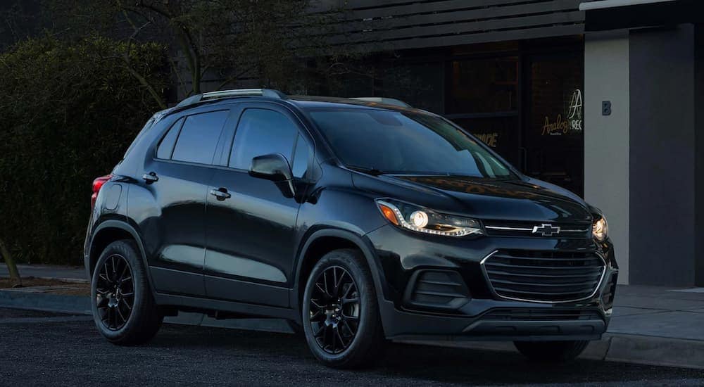 A black 2021 Chevy Trax is shown from the front at an angle after leaving a used Chevy dealer.